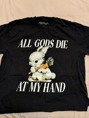 "ALL GODS DIE AT MY HAND," designed by Meg Turner for the group Mega64.